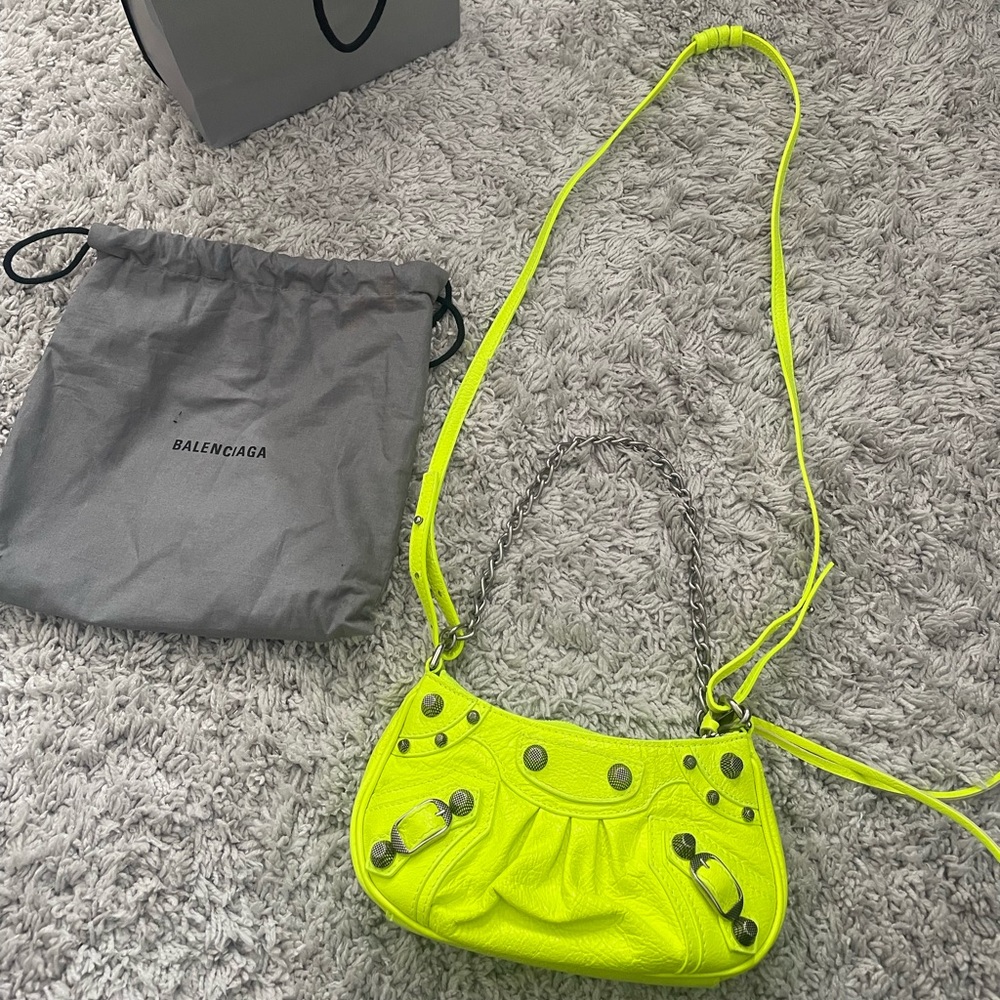 BALENCIAGA
Le Cagole Mini Neon Crossbody Bag